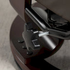 Fauteuil inclinable pivotant en similicuir gris et marron avec pouf, une place