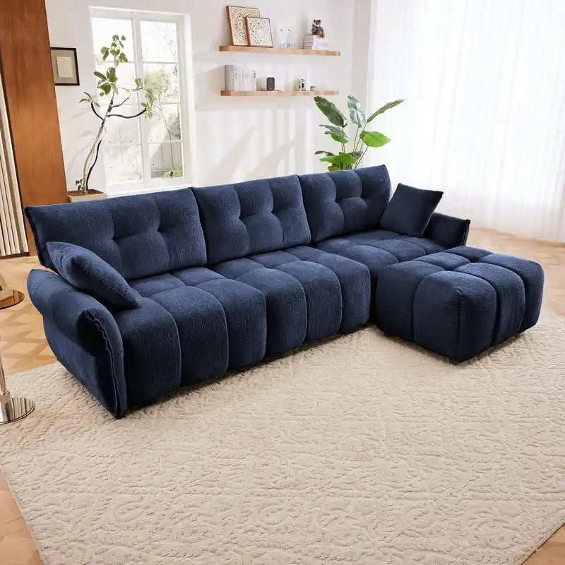 Canapé 3 places en chenille bleu / vert / orange brûlé / blanc avec pouf