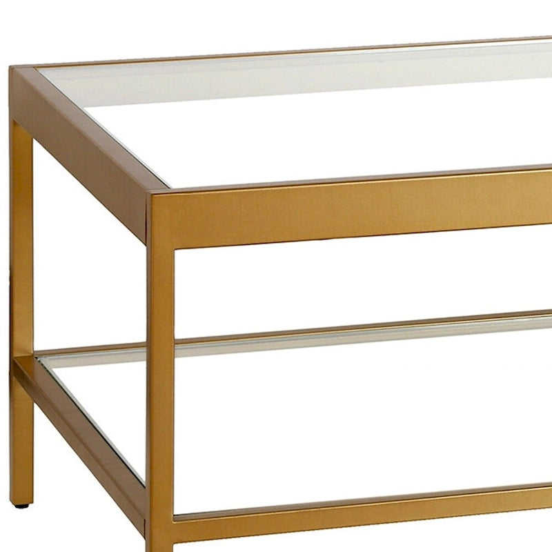 Table basse rectangulaire 54", verre transparent et cadre en acier noir/doré, moderne, 1 étagère